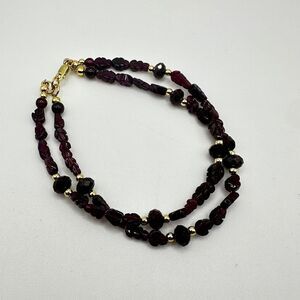 ~8" carved and faceted garnet bracelet with gold tone accent beads, 925 clasp!